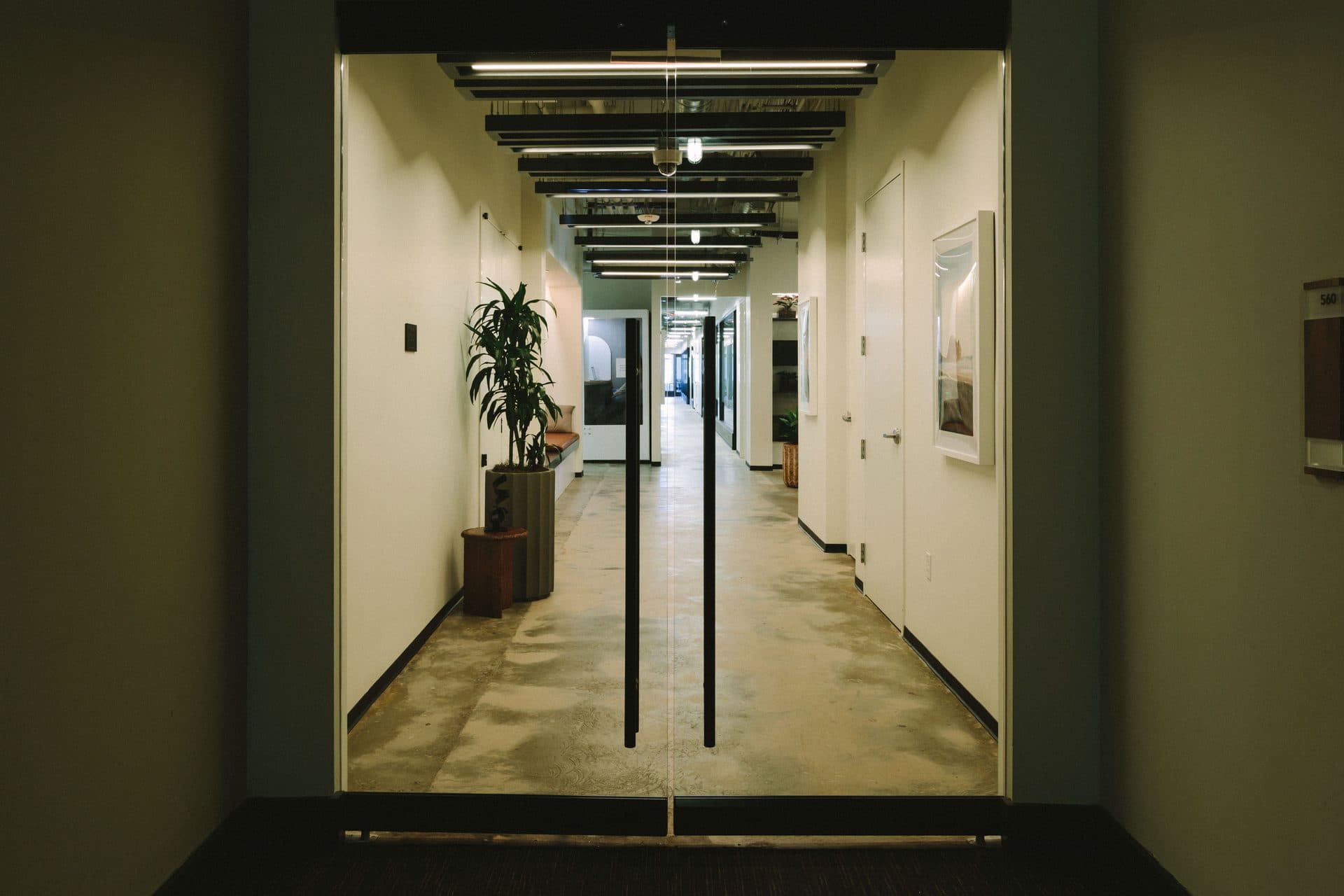 Glass entry to 560 Flex inside Cummins Station, Nashville